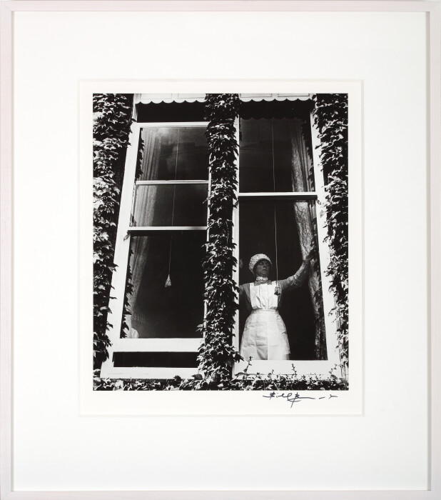 Bill Brandt, Parlourmaid at a Window in Kensington, 1939, gelatin silver print mounted on board, 50.8 x 40.6 cm, Bill Brandt © Bill Brandt Archive