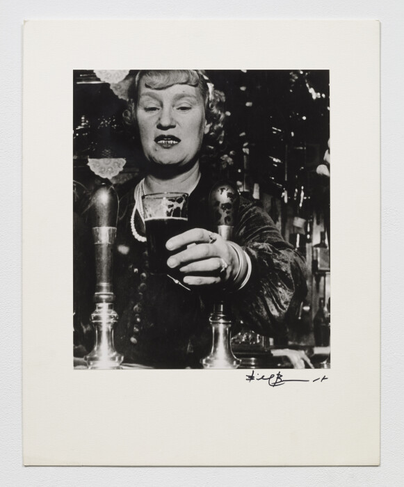 Brandt, Barmaid at the Crooked Billet, Tower Hill, 1939, gelatin silver print mounted on board, 50.8 x 40.6 cm, Bill Brandt  © Bill Brandt Archive