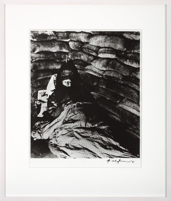 Bill Brandt, Old Lady in a Pimlico Air-Raid Shelter, Her Silver-Handled Umbrella Safely Tucked Away behind Her, 1939, printed 1975-76, gelatin silver print, 40.6 x 30.5 cm,