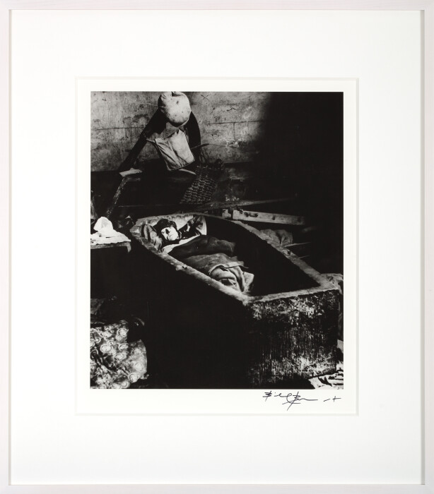 Bill Brandt, Asleep in a Sarcophagus in Christ's Church, Spitalfields, 1940, gelatin silver print mounted on board, paper 50.8 x 40.6 cm (framed) ,  Bill Brandt © Bill Brandt Archive